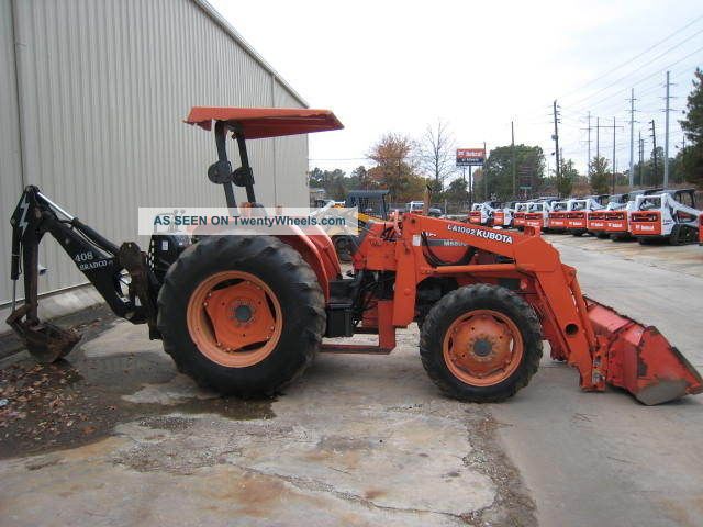 2002 Kubota M6800 W/ La1002 Loader,  4wd,  W/ Bradco 408 Backhoe, Tractors photo