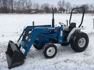 Ford 1715 Compact Tractor & Loader - Diesel - 4x4 - 900 Hours photo