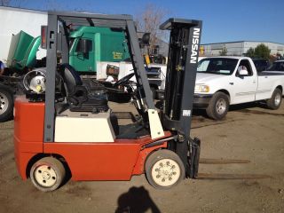 Nissan Forklift,  Cushion Tire,  S/s,  5000lb,  Tripple Stage,  4 Way Valve photo