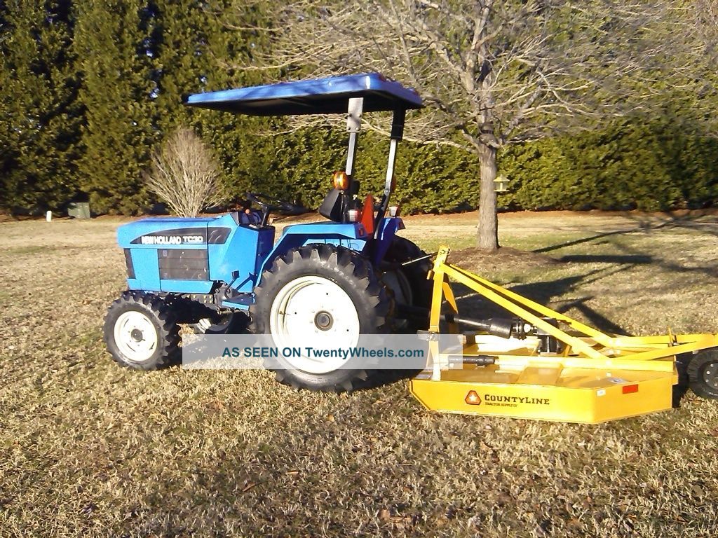 Holland Tc30 4wd Tractor 30 Hp 581 Hours Tractors photo