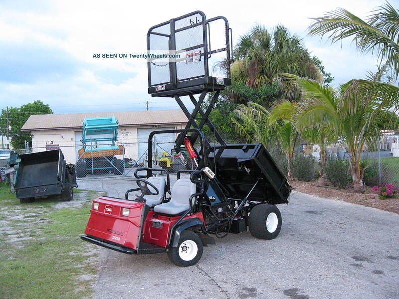 Toro Workman 3100 Dump Body Scissor Lift Man Lift Utility Vehicles photo