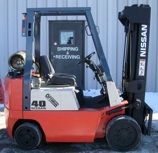 Nissan Model Cpj02a20pv (2004) 4000lbs Capacity Lpg Cushion Tire Forklift photo