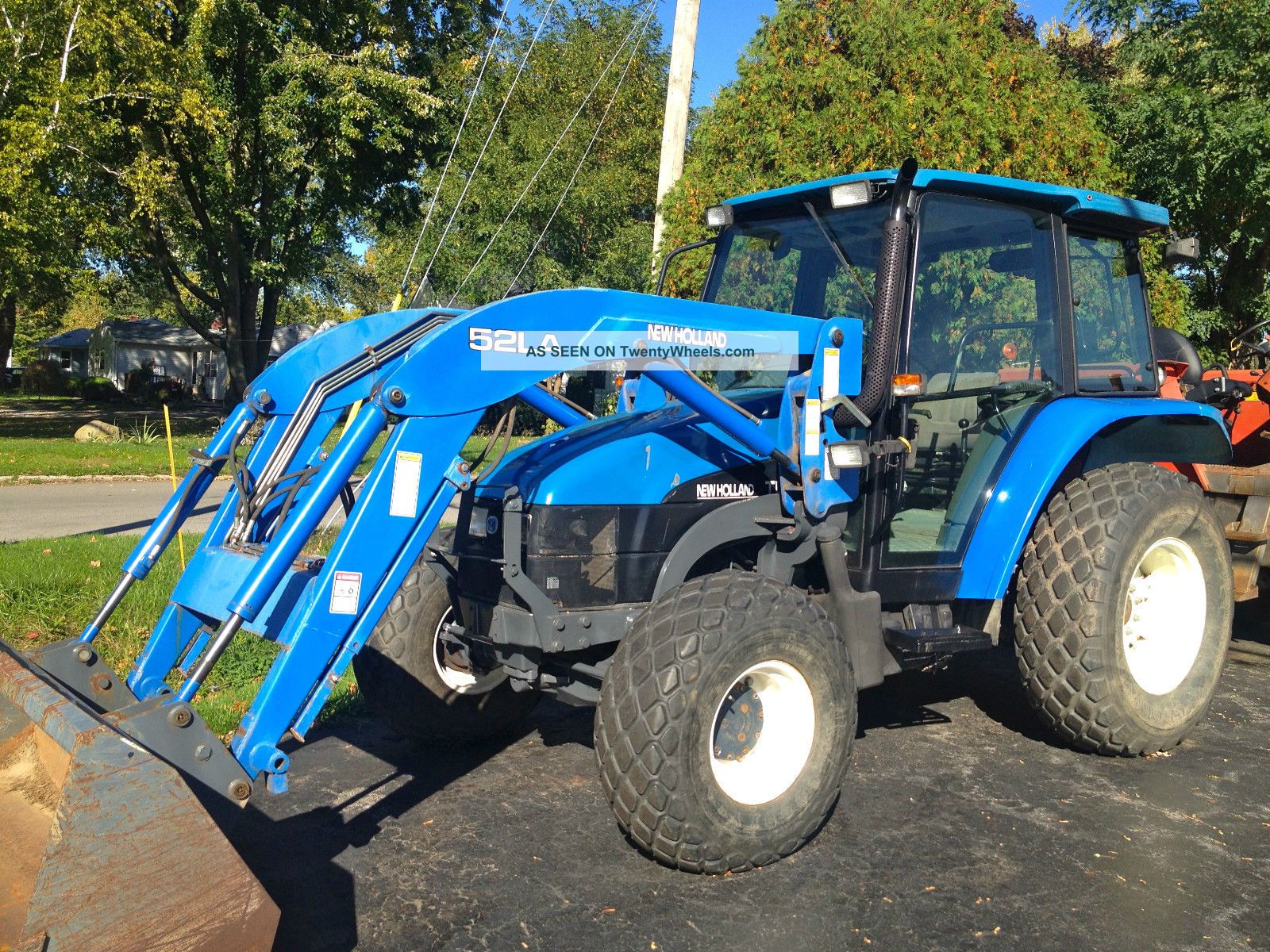 Holland Tl70 With Loader 70hp Tractors photo