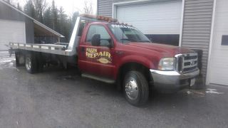 2002 Ford F - 450 Rollback Wrecker Flatbed photo