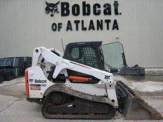 2010 Bobcat T650,  Good Tracks,  Good Paint,  Cab,  Std Controls,  Radio photo