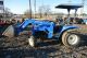 Holland Tc33d Steer 33hp Tractor 4wd With Loader And Bucket Rops Tractors photo 1