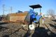 Holland Tc33d Steer 33hp Tractor 4wd With Loader And Bucket Rops Tractors photo 2