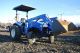Holland Tc33d Steer 33hp Tractor 4wd With Loader And Bucket Rops Tractors photo 3