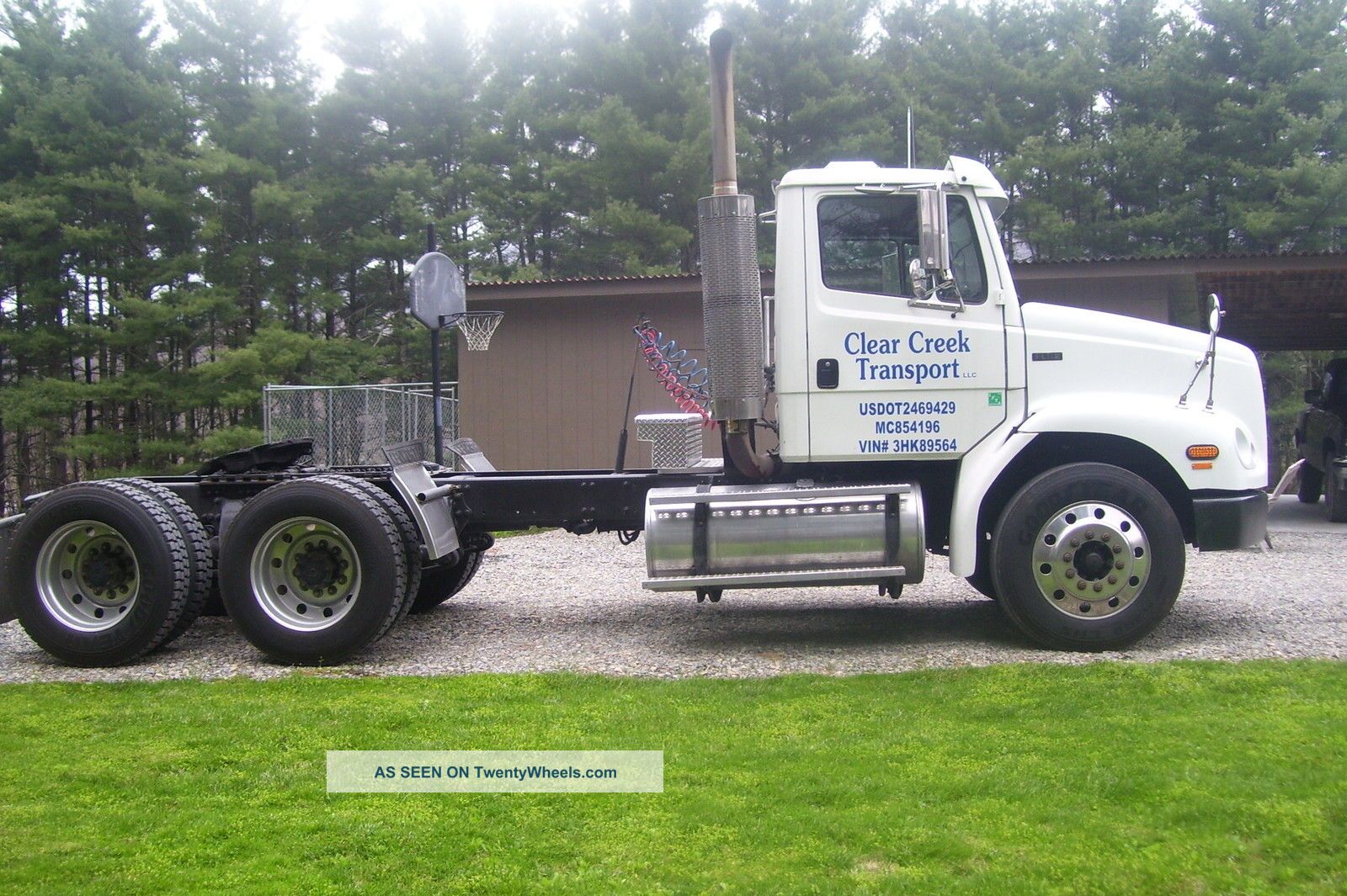 2003 Freightliner Fl112 Daycab Semi Trucks photo