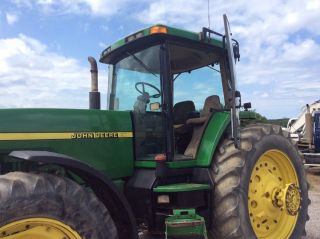 Heavy Equipment John Deere Tractor - 8400 photo