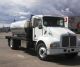 2002 Kenworth T300 Daycab Semi Trucks photo 1