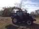 2006 Holland Ts115a 4x4 Tractor W/ Alamo Boom Mower Tractors photo 1