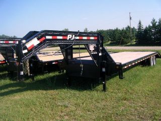 32 ' Gooseneck Flatbed With Monster Ramps photo