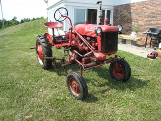 Farmall Cub With Cultivators And Flat Belt Pulley photo
