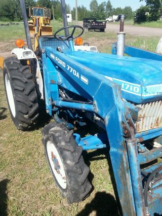 Ford 1710 Tractor With Woods Backhoe photo