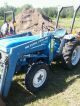 Ford 1710 Tractor With Woods Backhoe Tractors photo 1