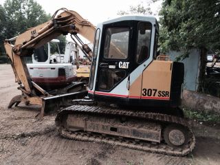 Cat Caterpillar 307 Ssr Track Excavator Construction Tractor Crawler Machine. . photo