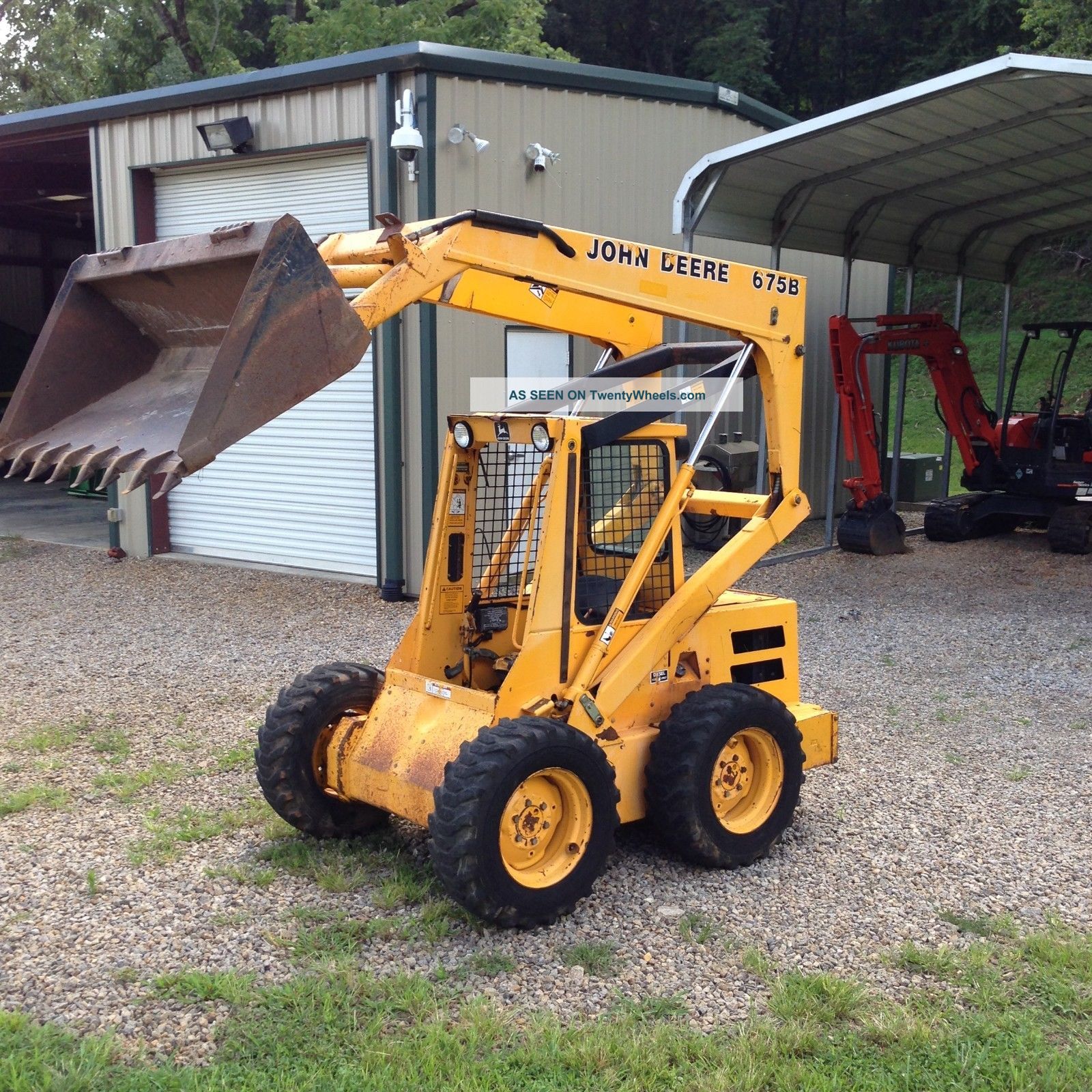 John Deere 675b Rubber Tire Excavator With Bucket