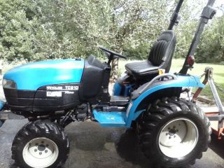 2003 Holland Tractor Tc21d 4x4 With 4 ' Brush Hog photo