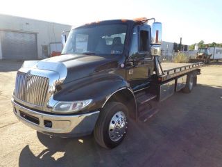 2007 International 4300 21 ' Steel Rollback Tow Truck photo