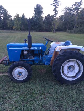 Ford 1700 4x4 Tractor W/ Only 1300 Hours.  Oringal Books photo