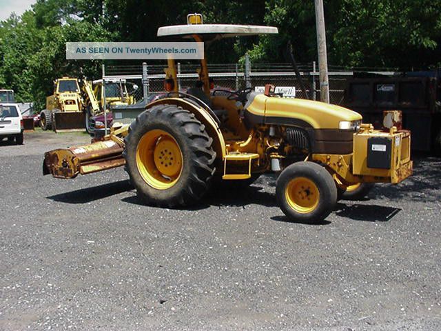 2001 Holland Tn75 Tractor With 7 Foot Alamo Flail Mower Tractors photo