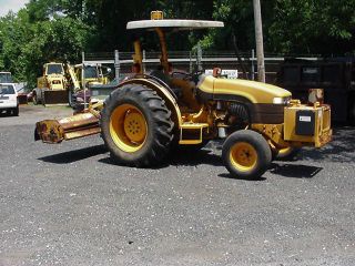 2001 Holland Tn75 Tractor With 7 Foot Alamo Flail Mower photo