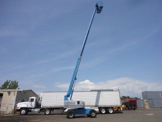 2003 Genie S - 60 Manlift 4cyl.  Gas And Lpg 60ft Platform 818 Hrs Stk Number 39063 photo
