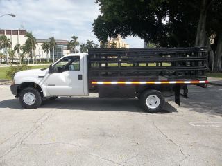2002 Ford F350 Flatbed 4x4 Diesel 7.  3 Stakebody Florida photo