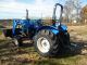 Holland Tn55 Diesel Farm Tractor With Self Leveling Holland 32la Loader Tractors photo 5