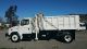 2001 Freightliner Fl60 Dump Trucks photo 2