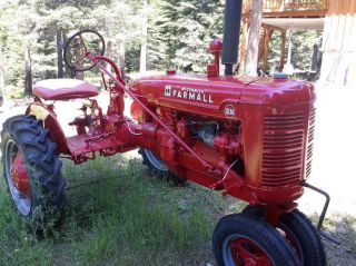 Restored Farmall Bn Lots Of Extras,  Plow,  Cultivator,  Weights,  Books photo