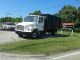 2001 Freightliner Fl60 Dump Trucks photo 3