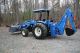 Holland Tc55da 4x4 Backhoe Loader Tractors photo 2