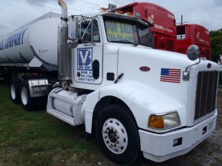 2001 Peterbilt 385 And 9200 Gallon Tanker With 4 Compartments photo