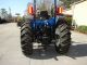 Holland Ts6.  110 2wd With Loader Tractors photo 1