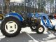 Holland Ts6.  110 2wd With Loader Tractors photo 2