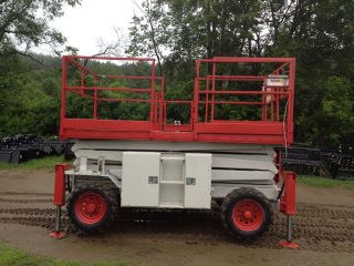 2000 Skyjack 8831 Scissor Lift With Outriggers photo