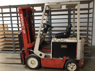 Nissan Electric Forklift Cym02l25s - Es And Charging Unit photo