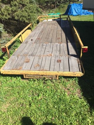 Open Cargo Trailer With Ramps photo