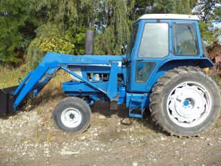 Ford 7700 Tractor With Loader,  Cab,  Diesel,  Pto. ,  Heater,  Air Two Buckets photo