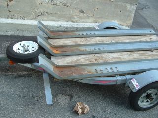 Load Rite Galvanazed 3 Rail Trailer For Motorcycles photo