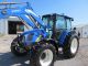Holland T5060 Diesel Farm Tractor 4x4 With Loader And Cab Tractors photo 1