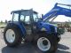 Holland T5060 Diesel Farm Tractor 4x4 With Loader And Cab Tractors photo 3