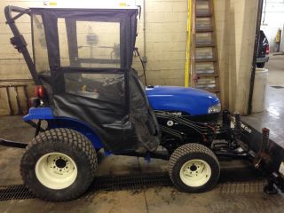 Holland Tc24d Compact Tractor W/snow Plow photo