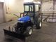 Holland Tc24d Compact Tractor W/snow Plow Tractors photo 6