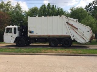 1998 Crane Carrier Co.  Low Entry Refuse Waste Garbage Truck photo