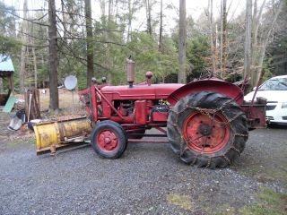 International Harvester I - 4 Tractor With Plow/and 7500lb Winch photo