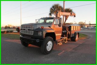 1994 Ford F700 Dump Truck With Crane photo