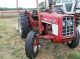 International 464 Gas Utility Tractor,  With Rough 5 Foot J.  D.  Rotary Cutter Tractors photo 1